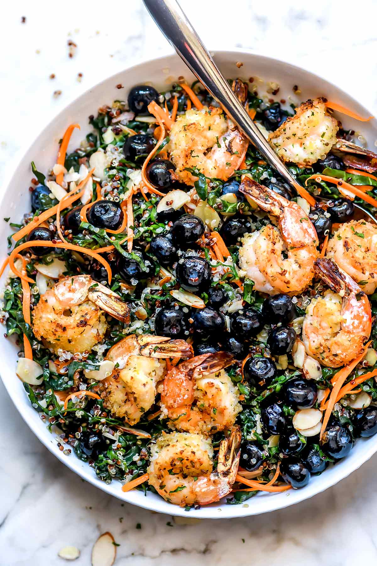 Kale Salad with Quinoa and Shrimp from foodiecrush.com on foodiecrush.com