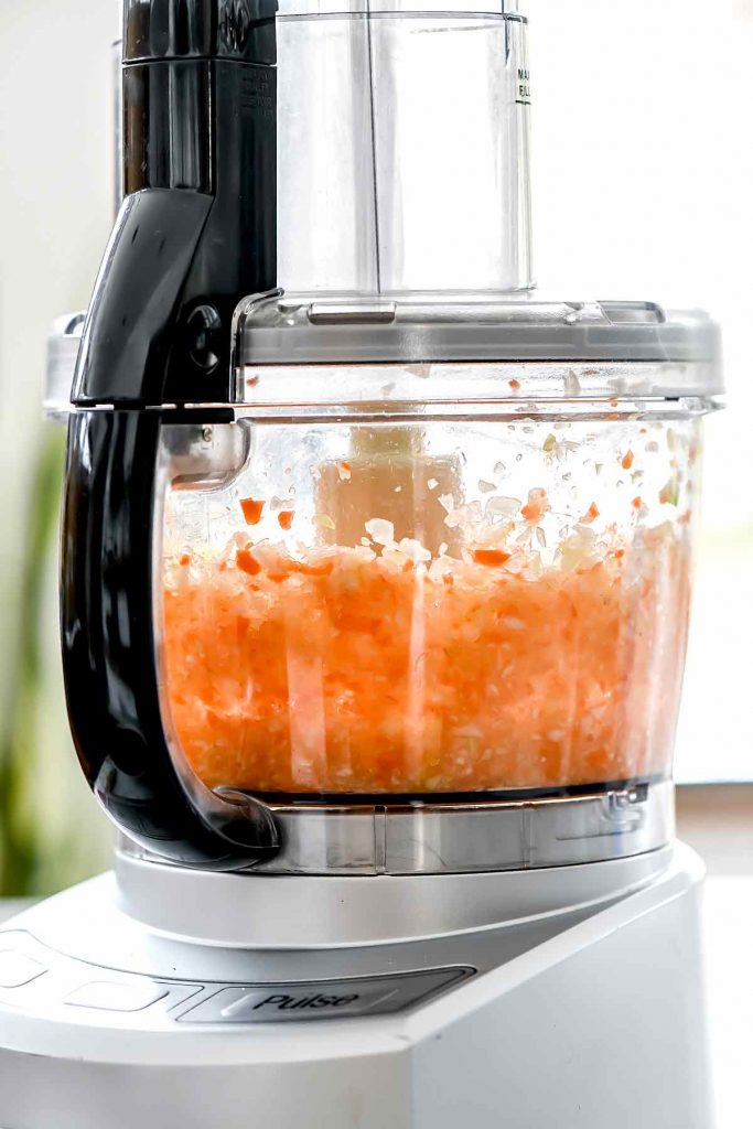Carrots and onion in food processor | foodiecrush.com