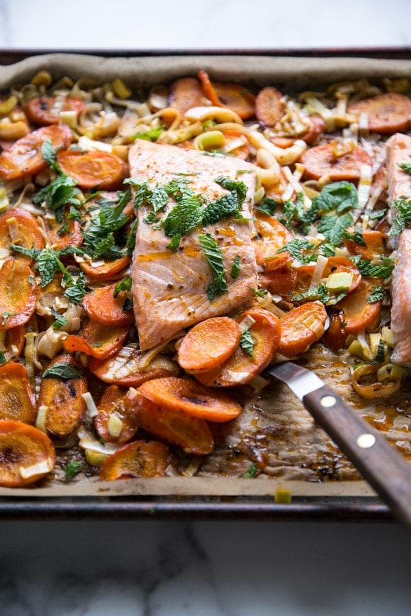 Harissa-Lemon Sheet Pan Salmon with Carrots and Leeks from Feed Me Phoebe on foodiecrush.com
