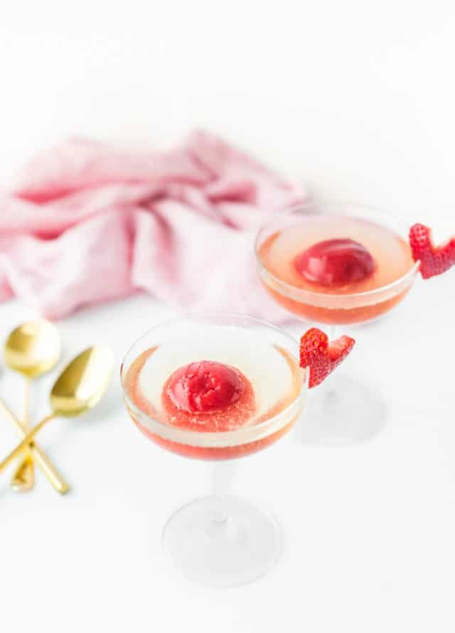 Strawberry & Rose Sorbet Champagne Cocktail from sugarandcloth.com on foodiecrush.com