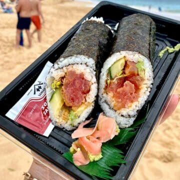 Spicy tuna handroll on beach foodiecrush.com