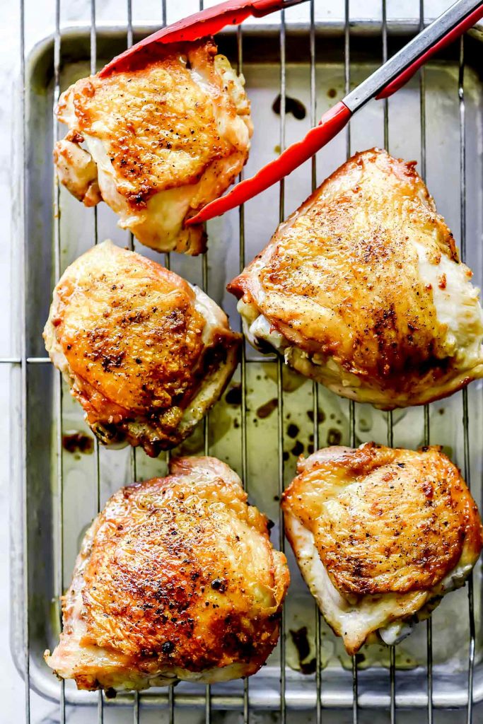 How to Cook THE BEST Chicken Thighs in pan then in oven foodiecrush.com