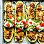 Taco Stuffed Zucchini Boats with toppings foodiecrush.com