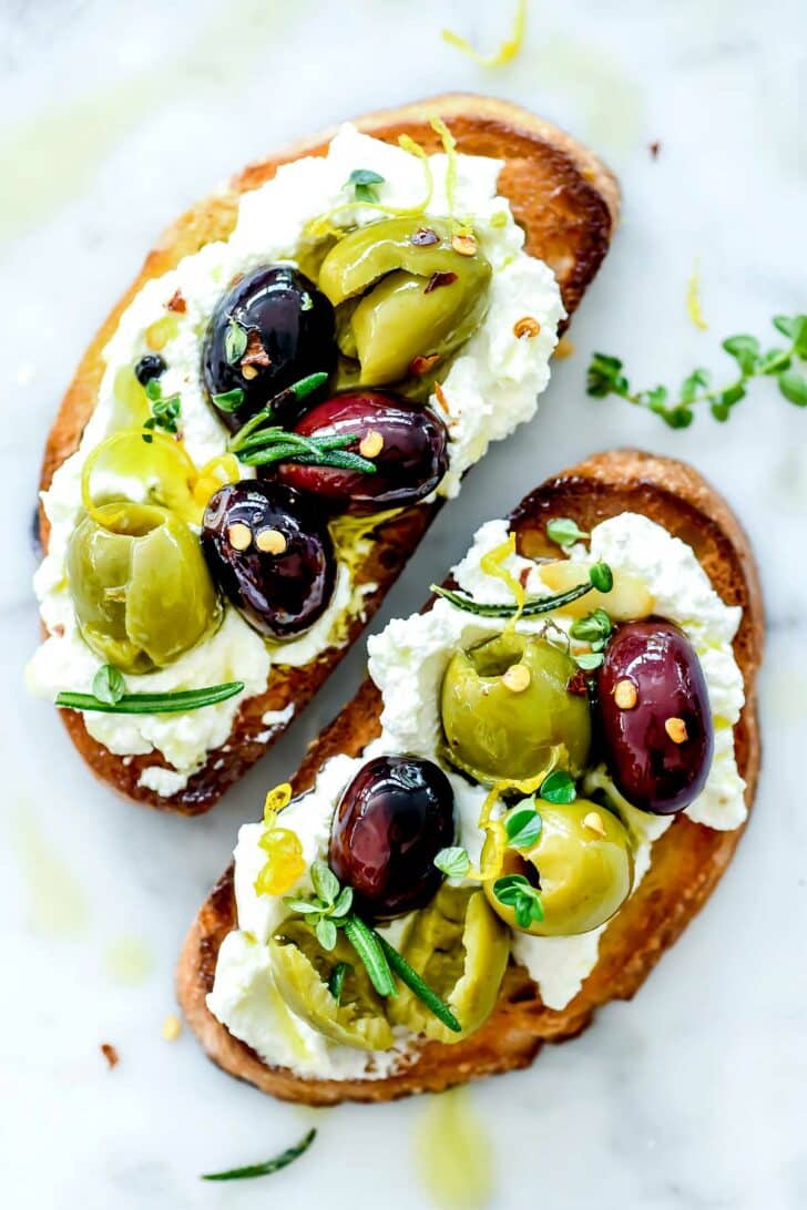 Marinated Olive and Ricotta Toast foodiecrush.com