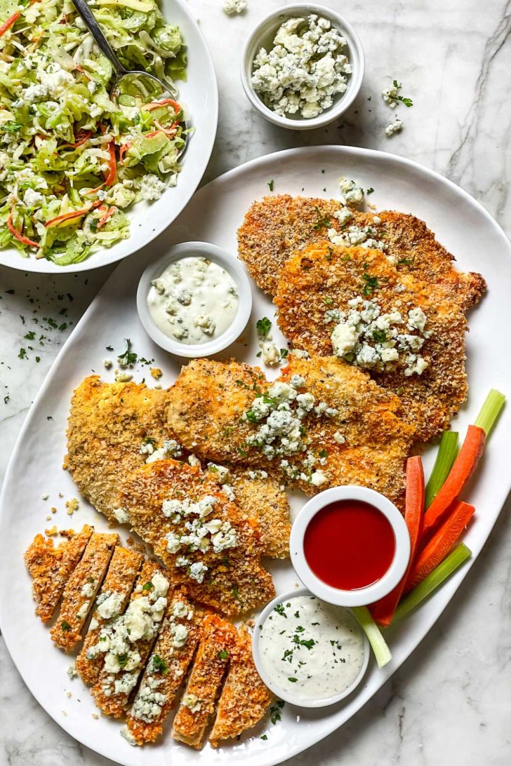 Baked Buffalo Chicken Breasts on plate with Celery Slaw foodiecrush.com