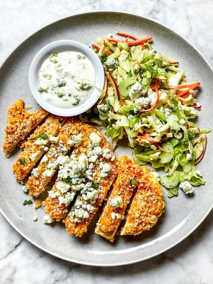 Baked Buffalo Chicken Breasts on plate with Celery Slaw foodiecrush.com