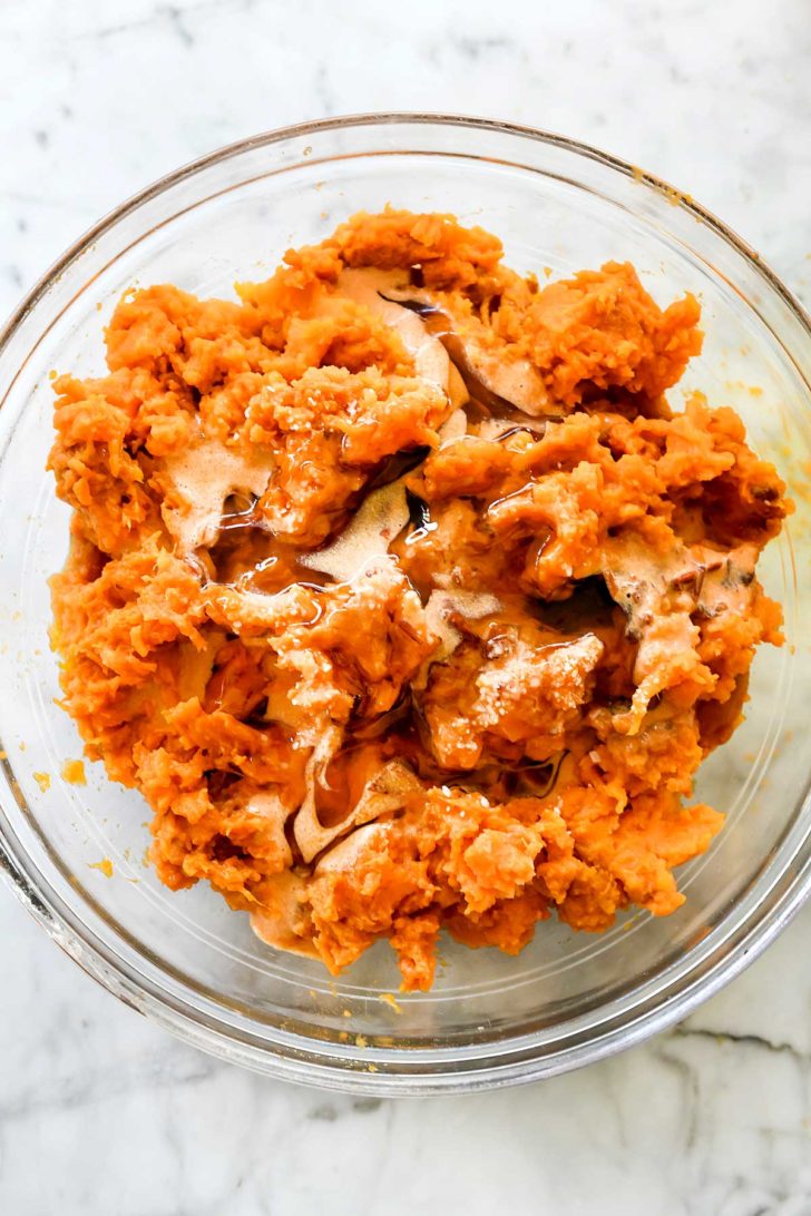 Chipotle Mashed Sweet Potatoes with maple syrup in bowl foodiecrush.com