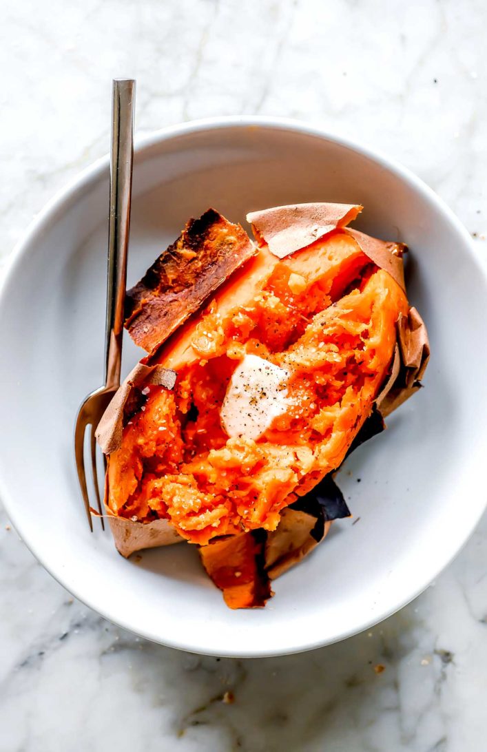 The BEST Roasted Sweet Potatoes in a bowl foodiecrush.com