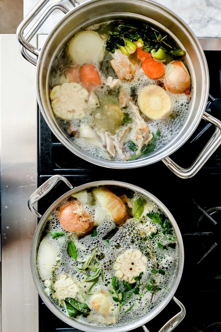 Turkey Stock simmering on stove foodiecrush.com