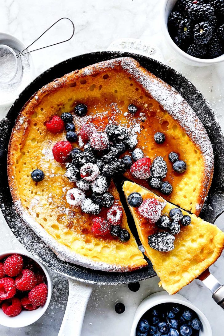 Dutch Baby with Syrup and Berries Slice foodiecrush.com