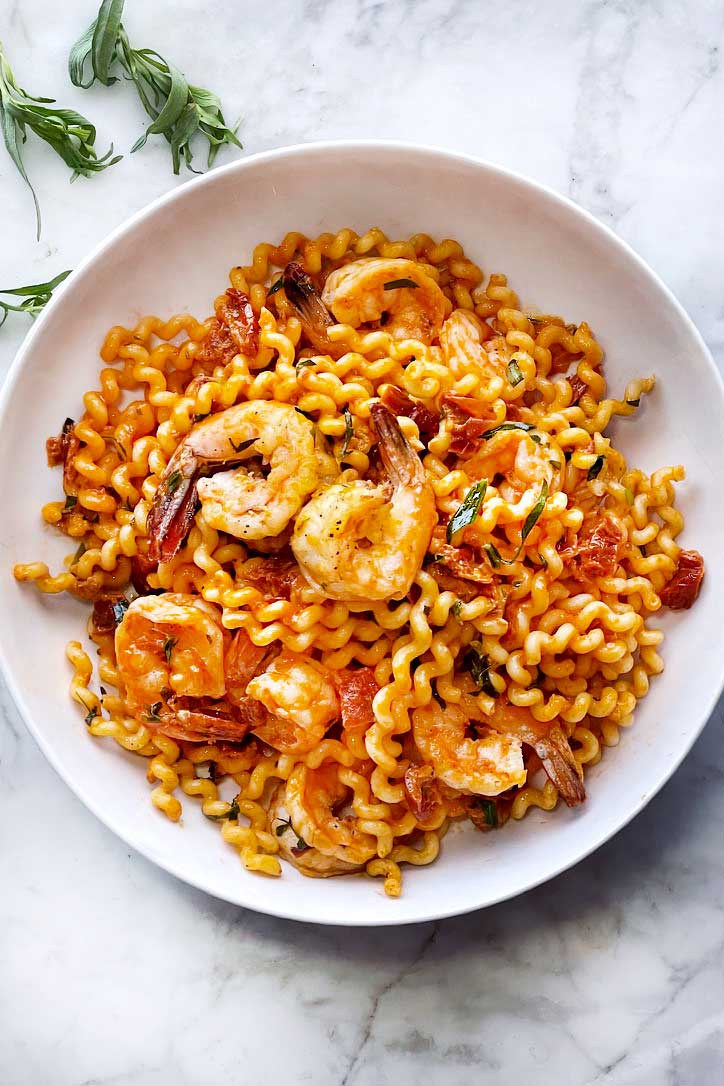 Shrimp Pasta with Sun-Dried Tomatoes in bowl foodiecrush.com