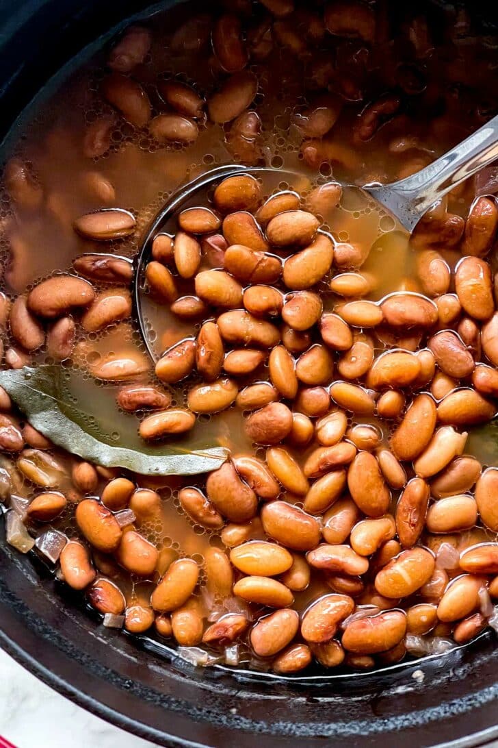 How to Make THE BEST Pinto Beans foodiecrush.com