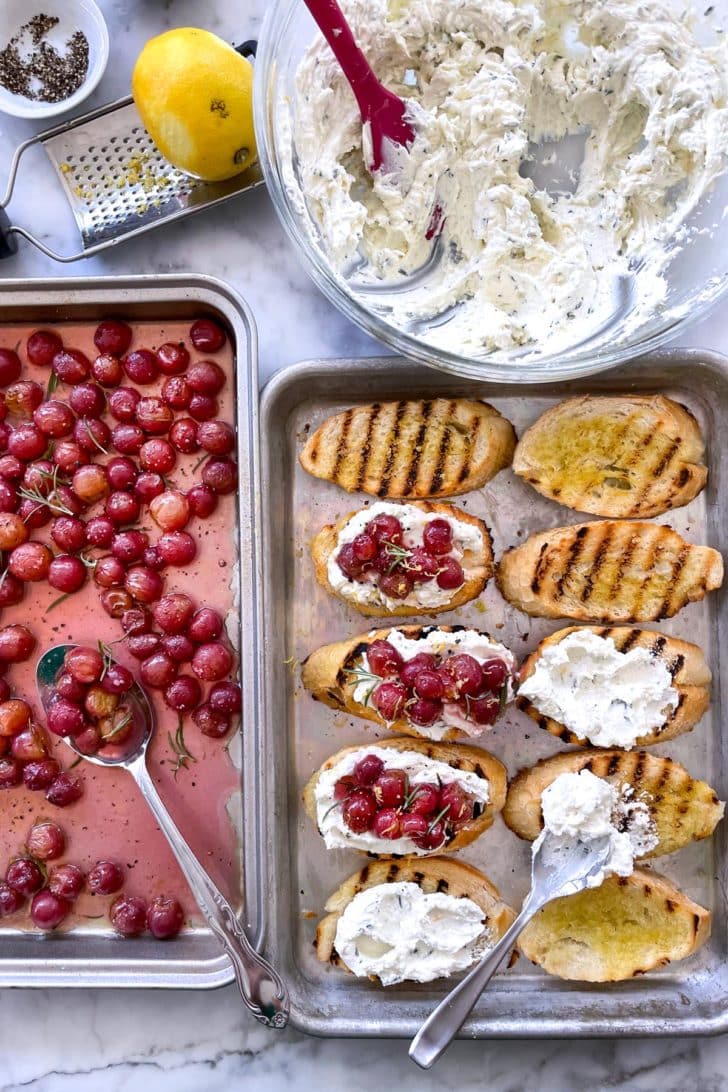 Roasted Grape and Whipped Goat Cheese Crostini assembly foodiecrush.com