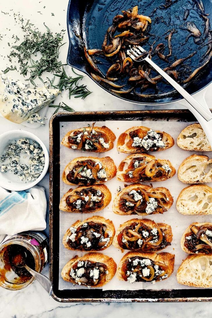 How to Make Caramelized Onion Crostini with Fig Jam and Blue Cheese on foodiecrush.com