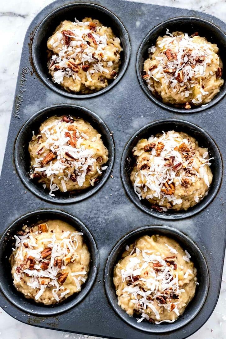 Banana Bread Muffins with Coconut and Pecans  in baking tin foodiecrush.com