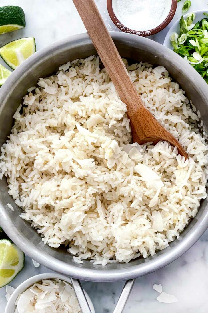 Coconut Rice in pan with spoon foodiecrush.com