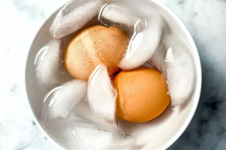 Hard boiled eggs in ice bath foodiecrush.com