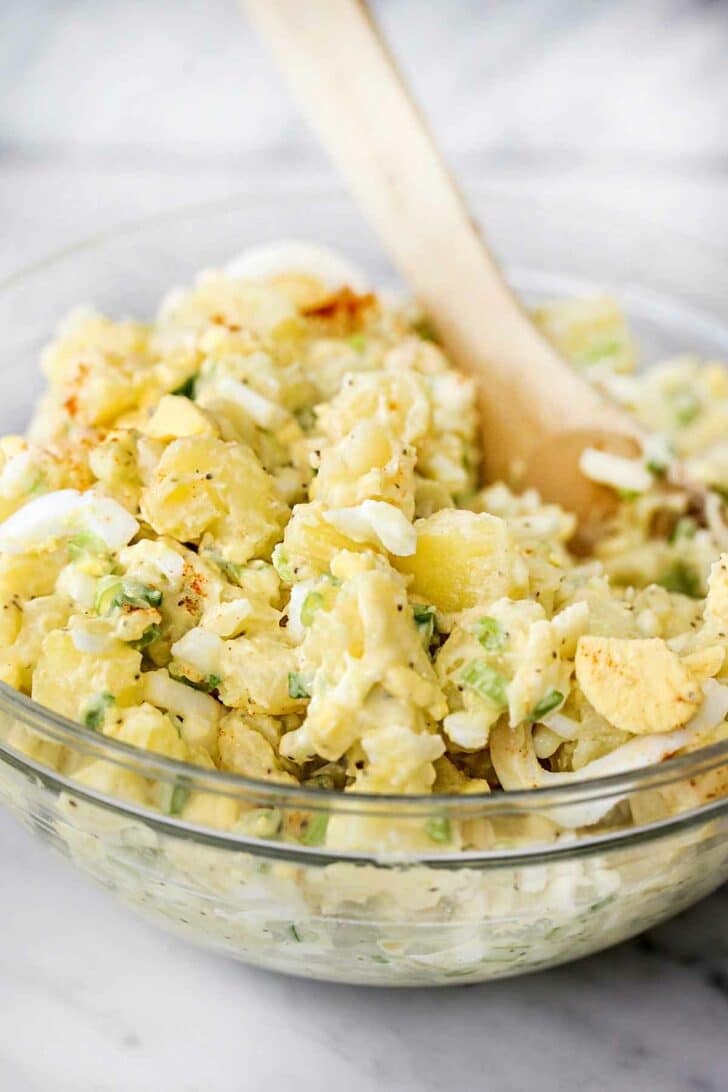 THE BEST Classic Potato Salad in bowl with spoon foodiecrush.com #potatosalad