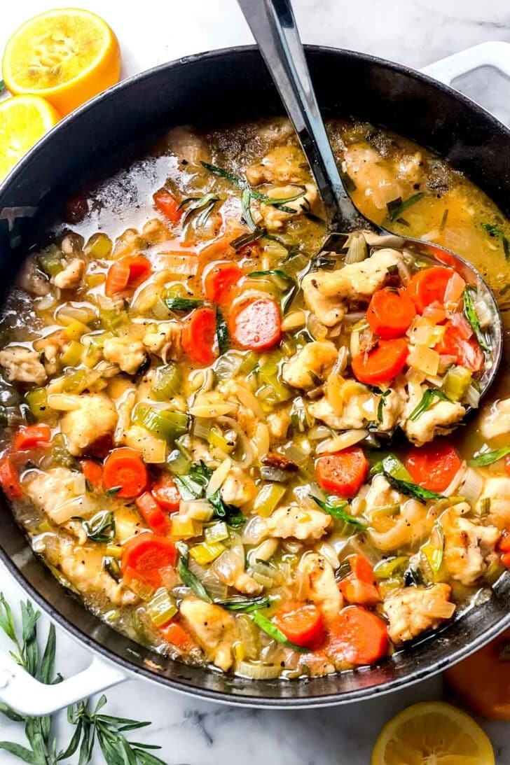 Lemony Chicken Stew with Orzo in dutch oven foodiecrush.com