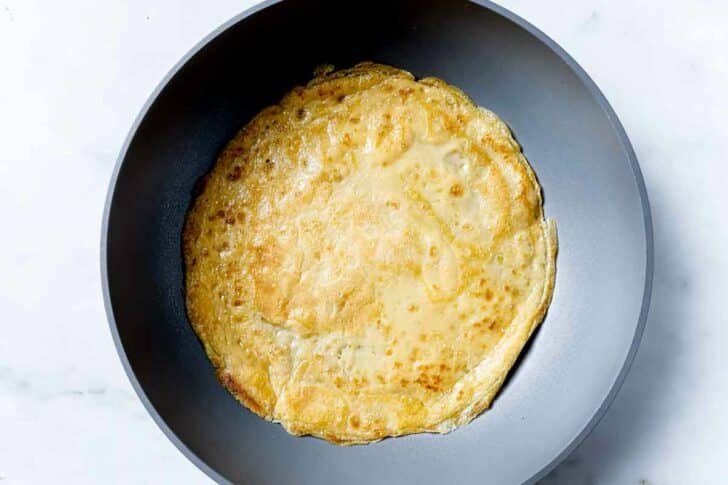 Crepe pancake in a pan foodiecrush.com