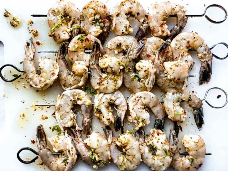 Raw shrimp on skewers foodiecrush.com