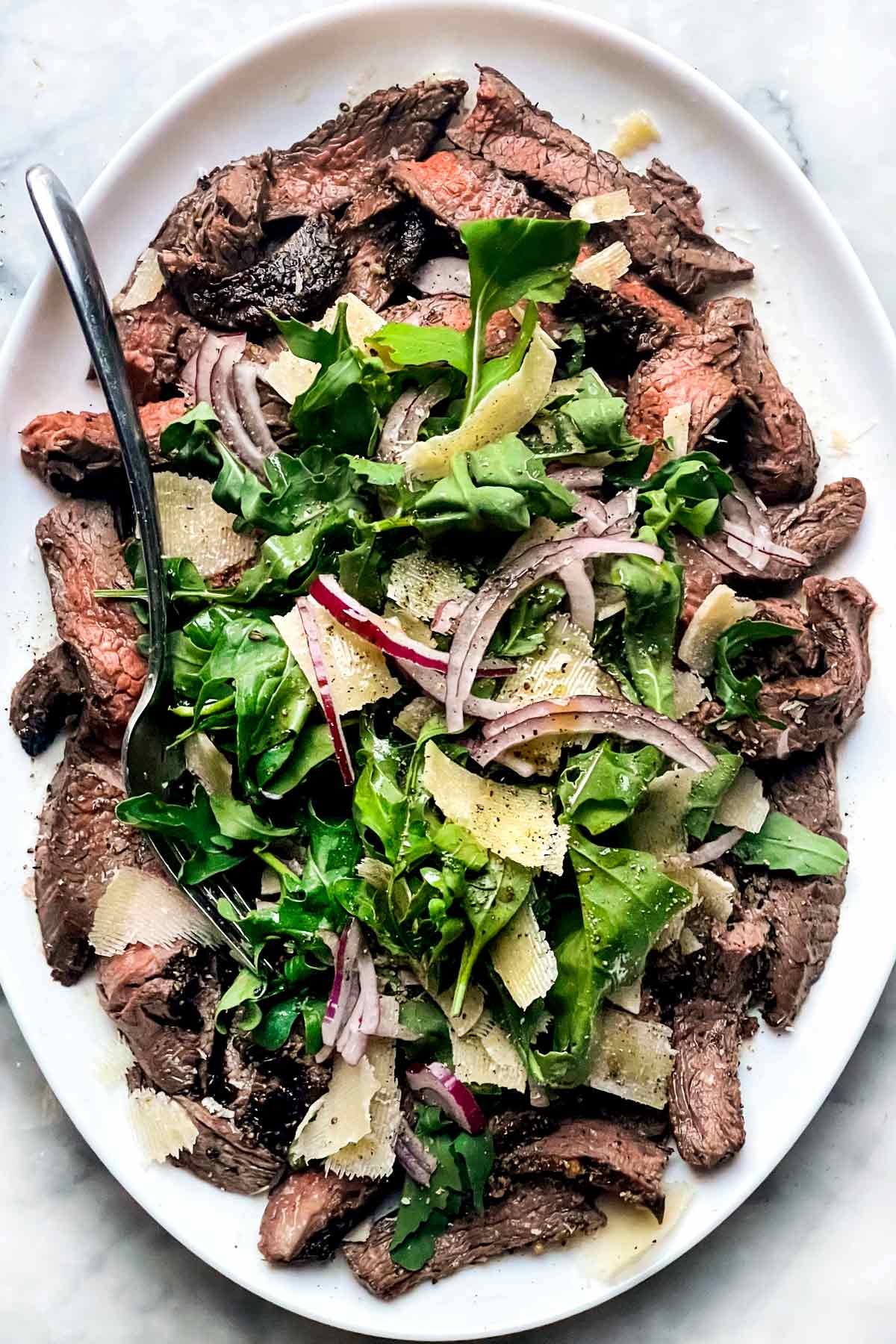 https://www.foodiecrush.com/wp-content/uploads/2023/07/Grilled-Flank-Steak-with-Arugula-and-Parmesan-foodiecrush.com-20.jpg