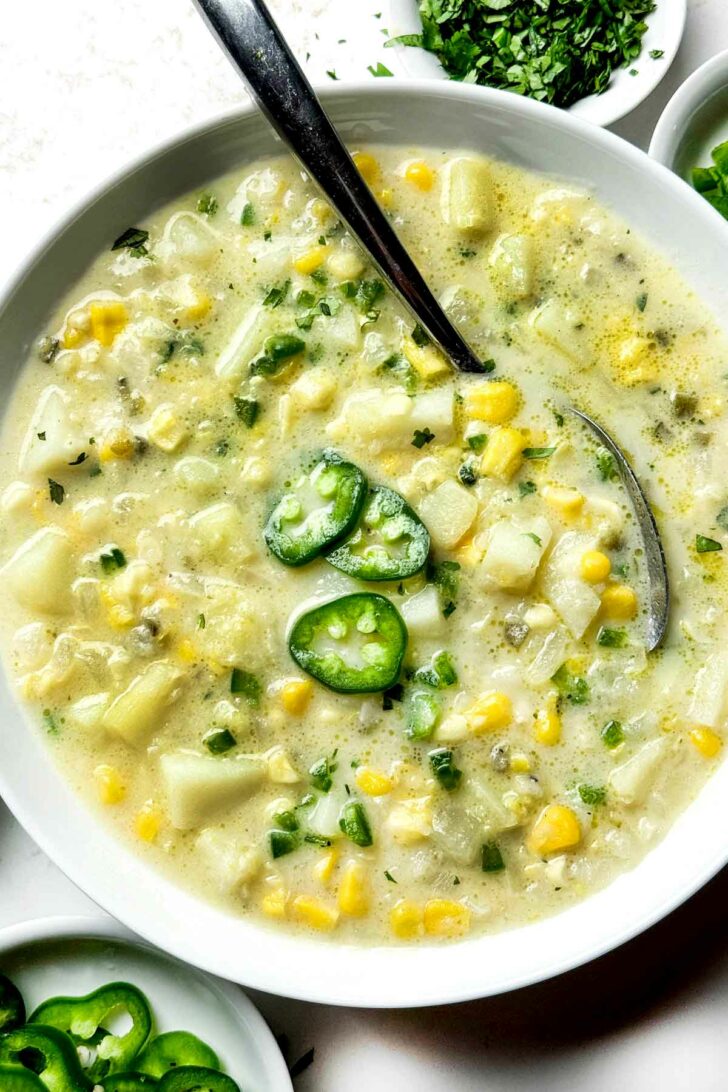 Potato Soup with Jalapeño and Corn successful  vessel  with spoon foodiecrush.com