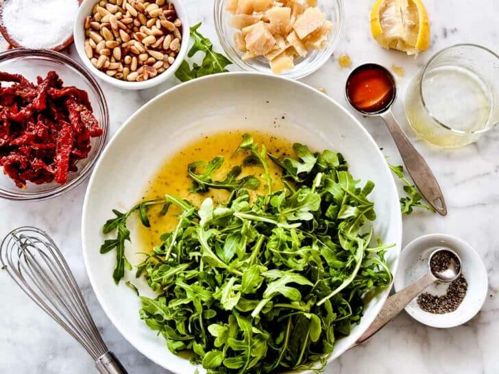 Arugula Salad with Sun Dried Tomatoes and Pine Nuts Salad ingredients foodiecrush.com #arugulasalad
