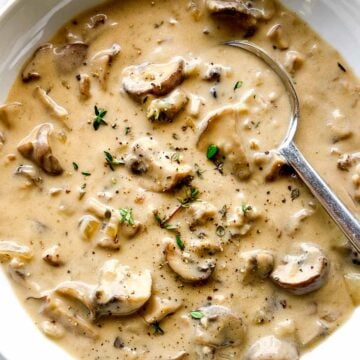 Cream of Mushroom Soup in bowl with spoon foodiecrush.com