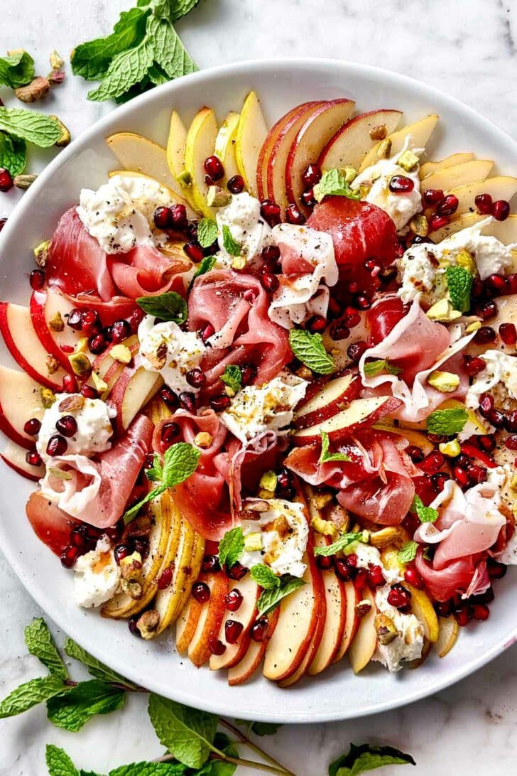 Pear and Burrata Salad with Prosciutto and Pomegranate foodiecrush.com #burratasalad