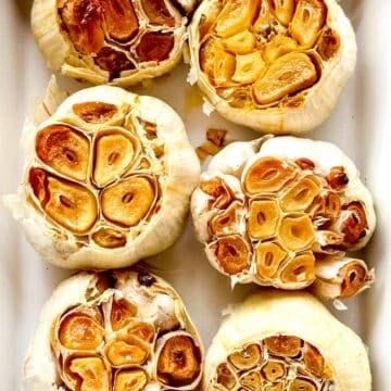 Roasted garlic in baking dish foodiecrush.com How to Make Roasted Garlic #roastedgarlic