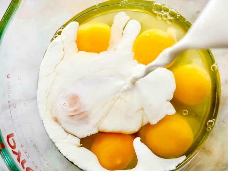 Eggs and milk in measuring cup foodiecrush.com