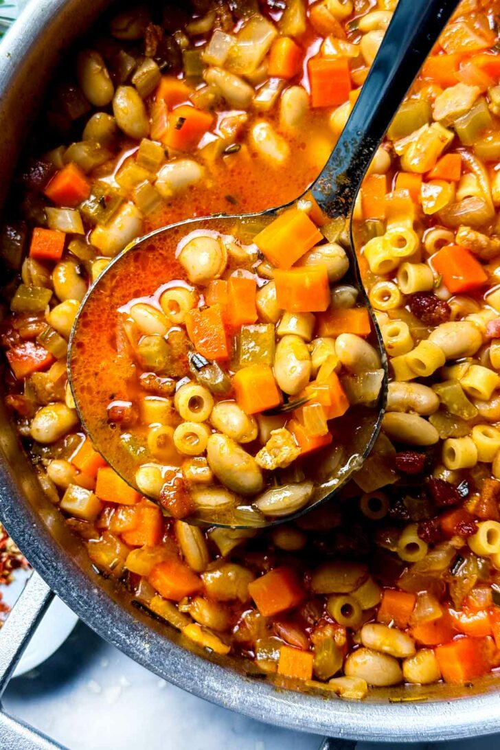 Pasta Fagioli Soup in pot with spoon foodiecrush.com