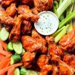 Baked Buffalo Wings with ranch dressing foodiecrush.com