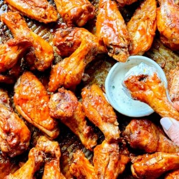Baked Buffalo Wings on baking sheet foodiecrush.com