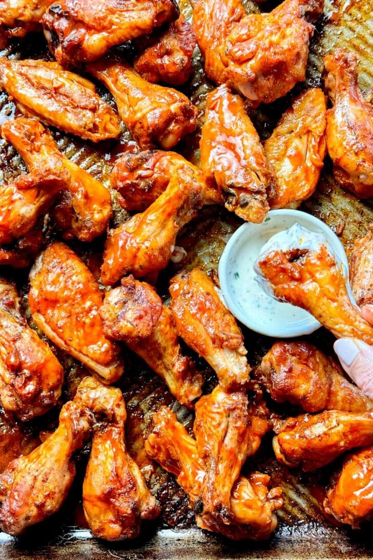 Baked Buffalo Wings on baking sheet foodiecrush.com