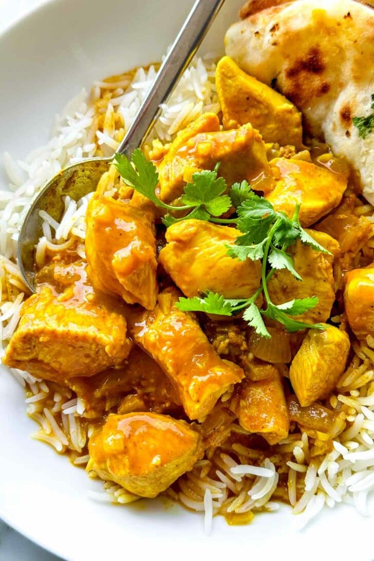 Indian Coconut Chicken Curry recipe over rice foodiecrush.com