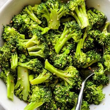 Sesame Broccoli recipe in bowl with spoon foodiecrush.com