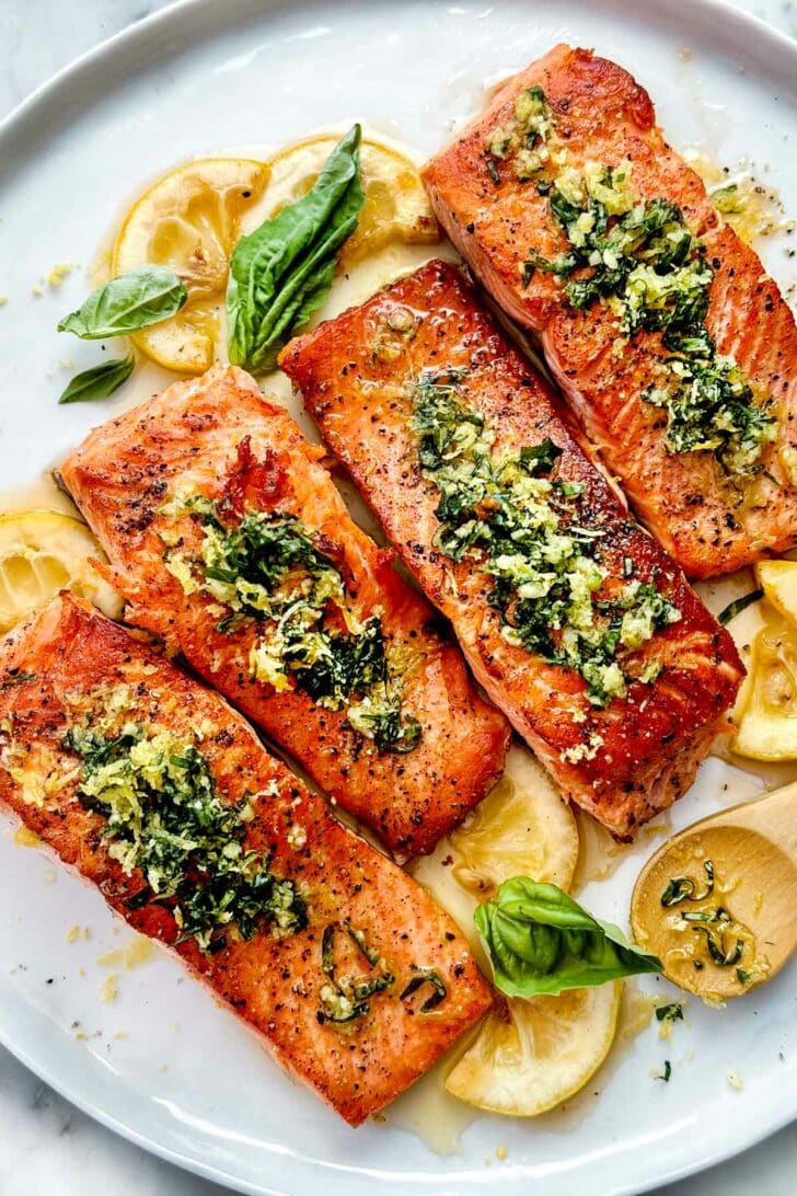 Pan Seared Salmon with Basil Gremolata on platter foodiecrush.com
