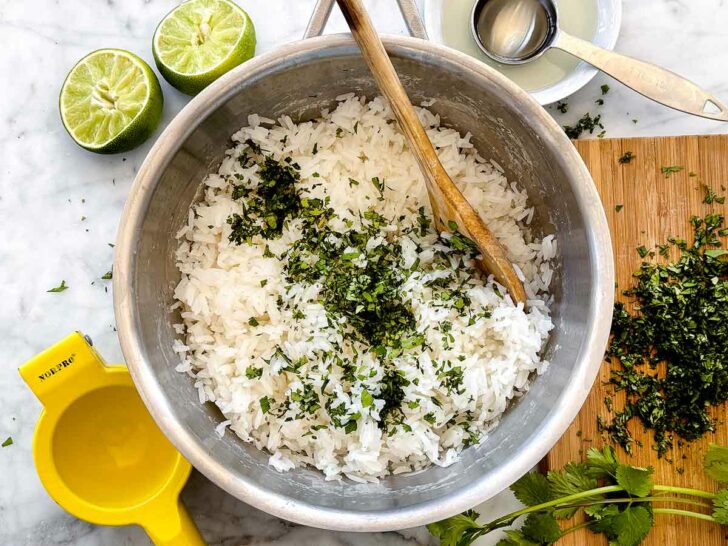 Cilantro Lime Rice in cooking in pot with spoon on foodiecrush.com