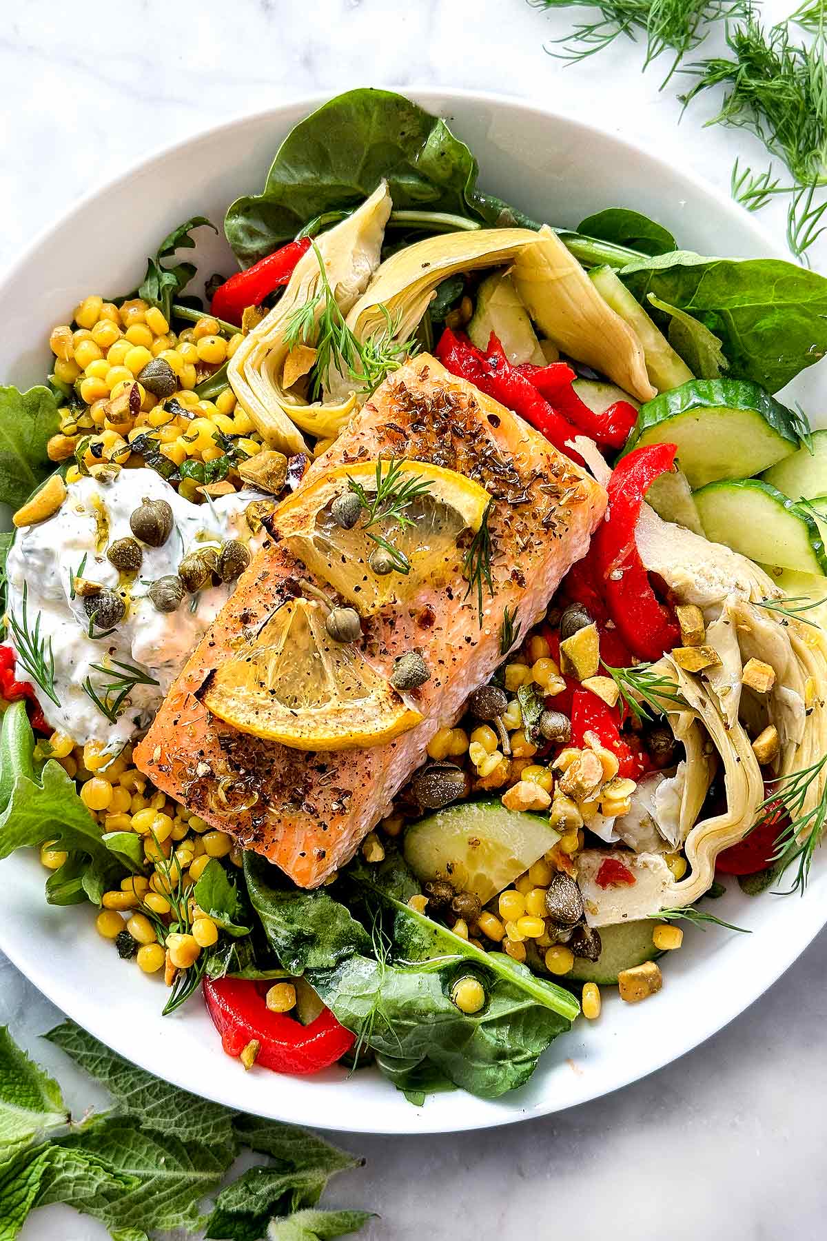 Mediterranean Salmon Bowls with CousCous and Tzatziki foodiecrush.com