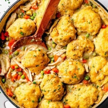 Chicken and Dumplings Recipe with spoon foodiecrush.com