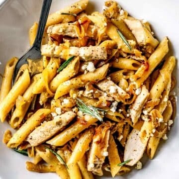 Penne with Chicken, Caramelized Onion and Blue Cheese on plate foodiecrush.com