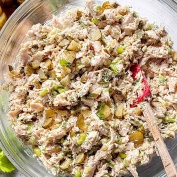 Dill Pickle Chicken Salad Recipe in bowl with spoon foodiecrush.com