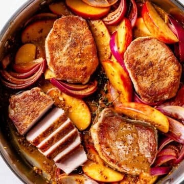 Pork Chops with Apples and Onions in skillet foodiecrush.com