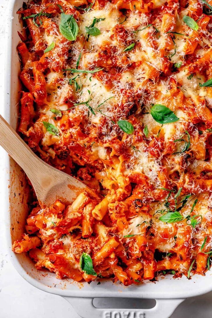 Baked Ziti in baking dish with spoon