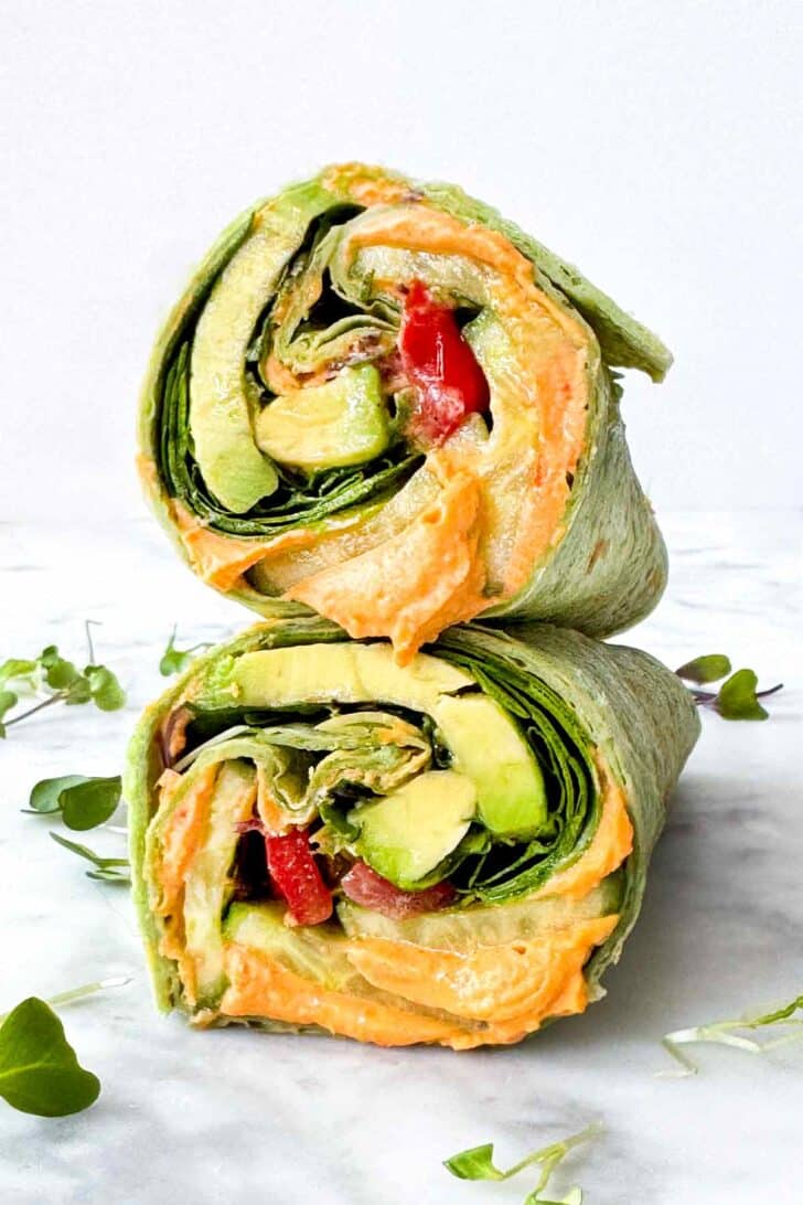 Hummus wrap with avocado and tomato