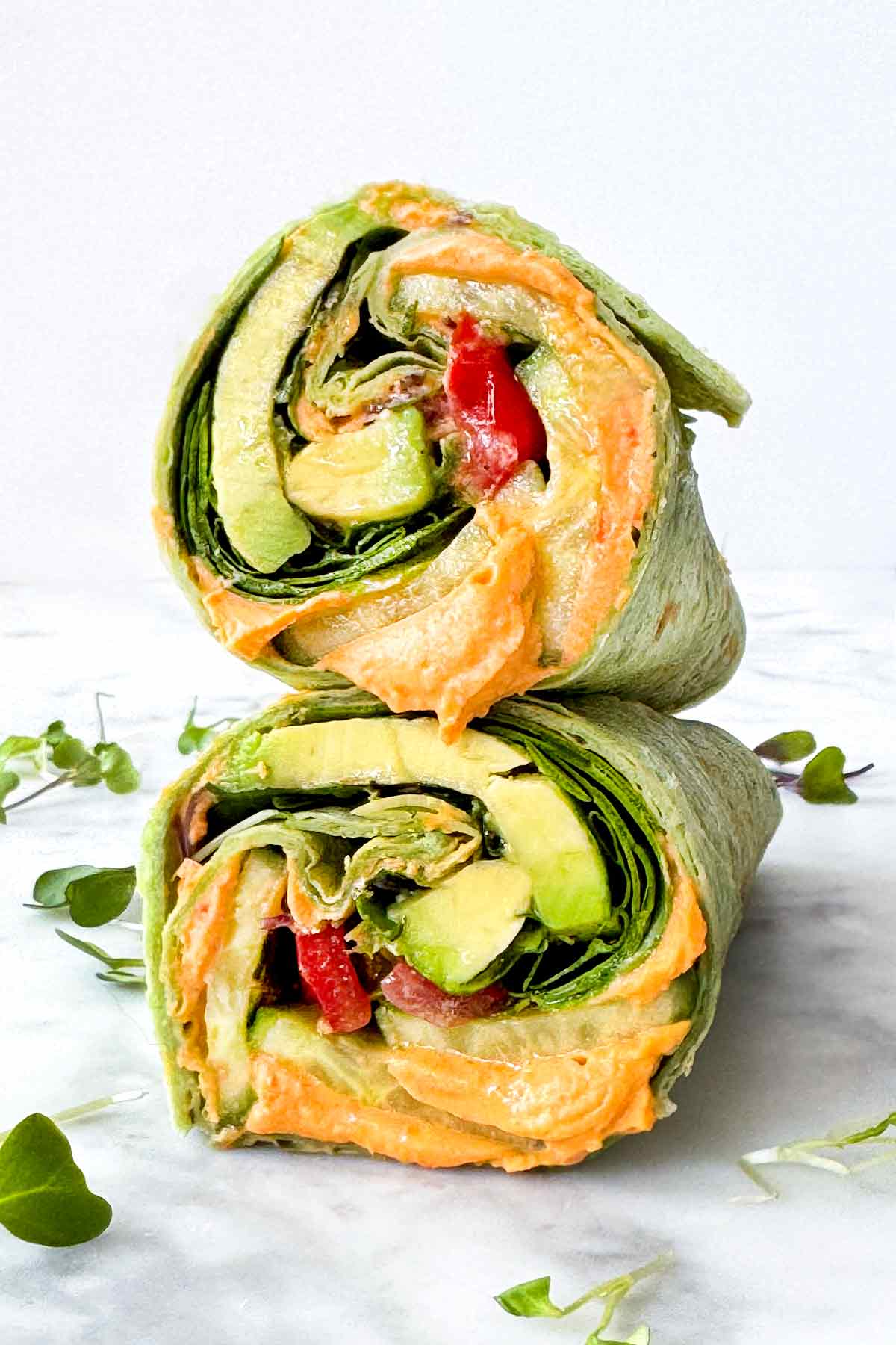Veggie wrap with hummus, avocado and tomato