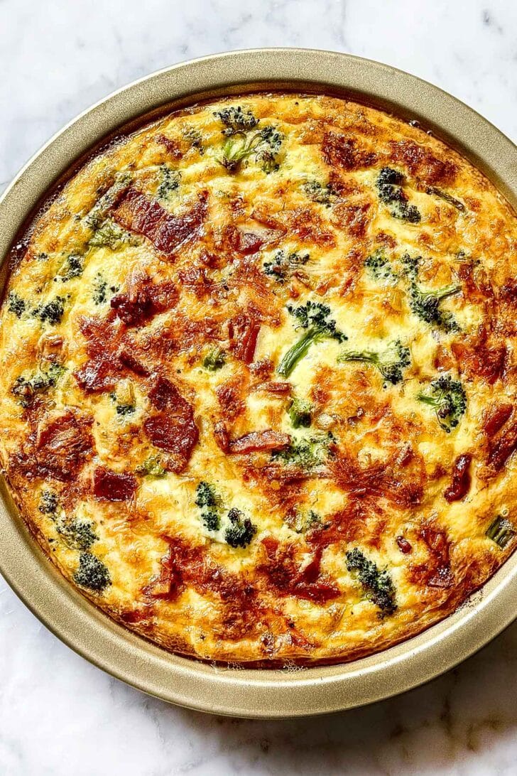 Crustless Quiche recipe with bacon broccoli and cheese in pie tin
