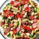 Italian Pasta Salad with tomatoes, salami, cucumber, mozzarella, and black olives